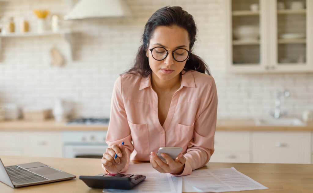 Woman using the Debt Repayment calculator